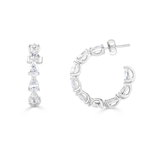 Pearl-Perfect Brilliance: Diamond Earrings in Captivating Pearl Shape