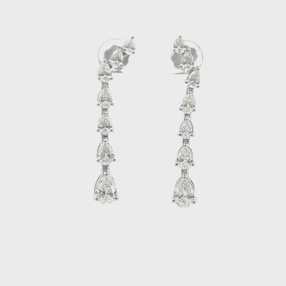 Pearlescent Radiance: Lab Grown Diamond Earrings with Central and Additional Diamonds in Pear Shape – Effortless Elegance in Every Curve