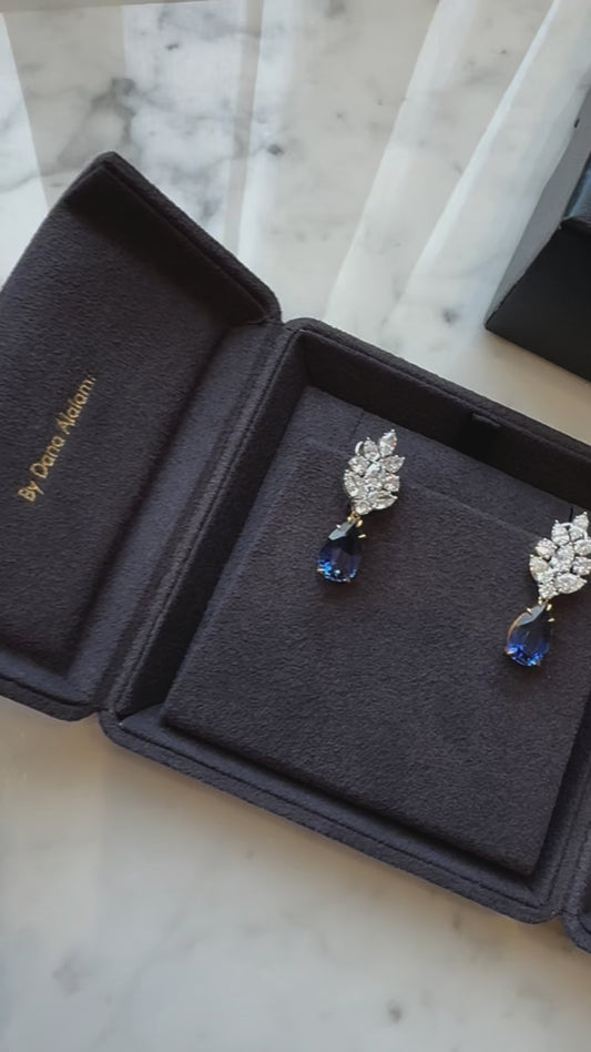 An Earring with a Majestic Mix between Pear Cut Blue Sapphire & Lab-Grown Diamonds