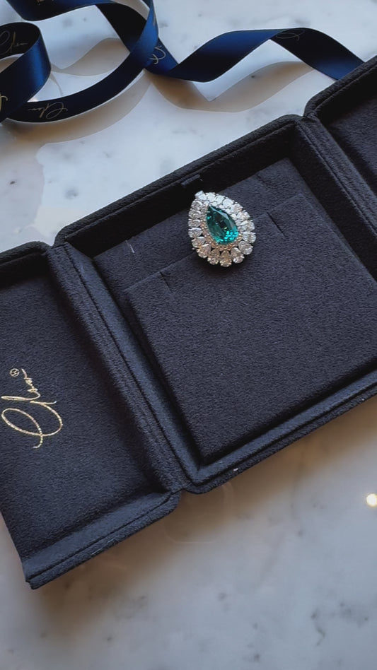 A Statement of Prestige and Elegance: Pear-Shaped Blue Sapphire Brooch
